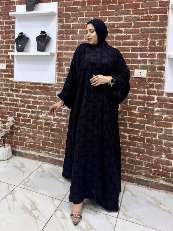 Woman in elegant black attire
