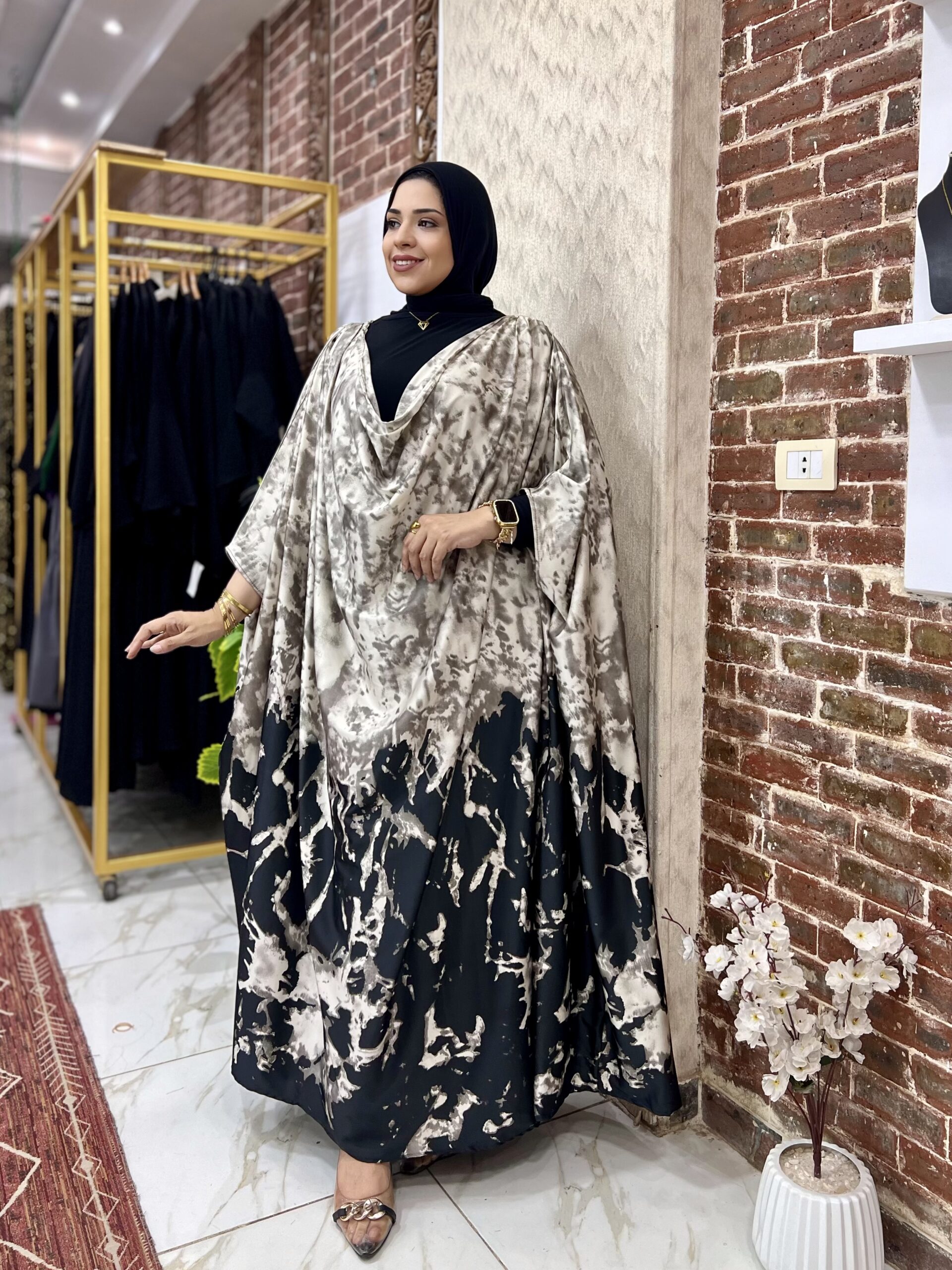 Elegant woman in stylish dress.